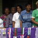 Nancy Pettway, left, Queenie Pettway, Allie Pettway, Lola Pettway, Lucy Marie Mingo and Arlonzia Pettway pose with their quilts on the porch of a Gees Bend, Ala., home, Thursday, May 15, 2003 following a show at the Whitney Museum in New York.